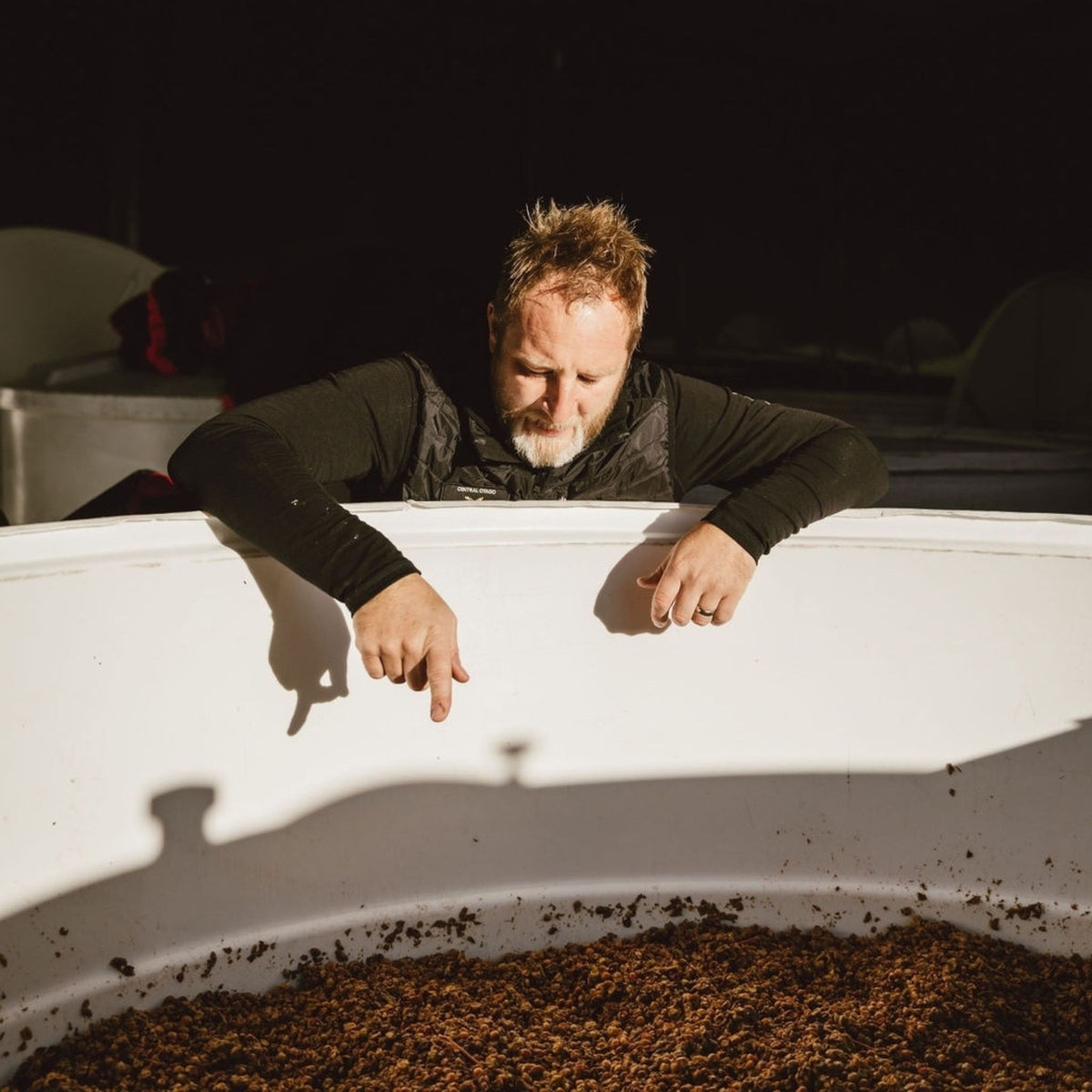 Winemaker Alan Peters-Oswald checking ferments - Kent Street Cellars